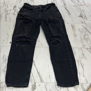 Woman’s Black Distressed Jeans